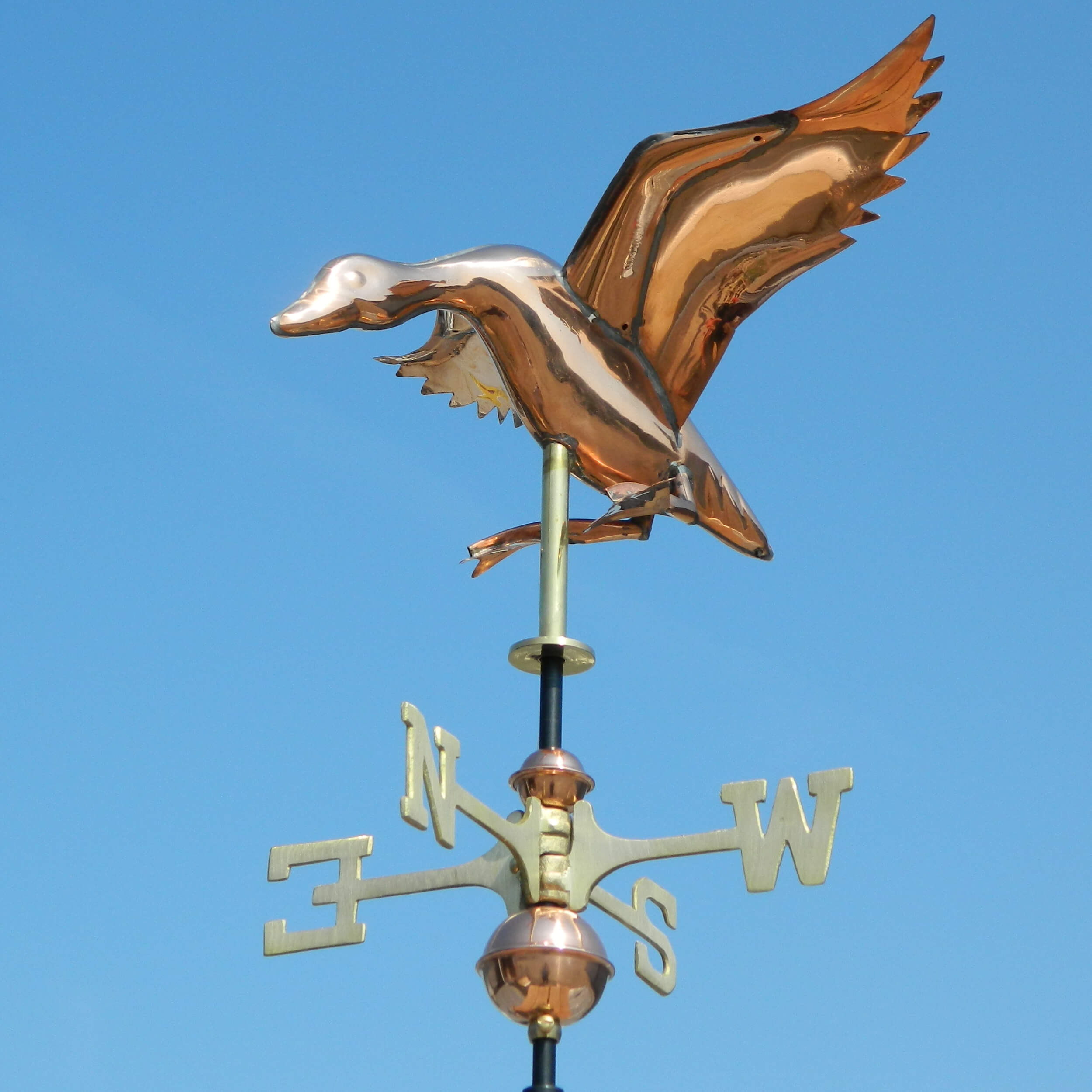 Polished copper weathervanes.jpg